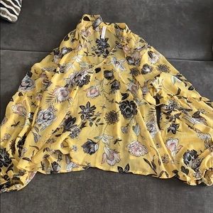 Sheer yellow blouse with flowers